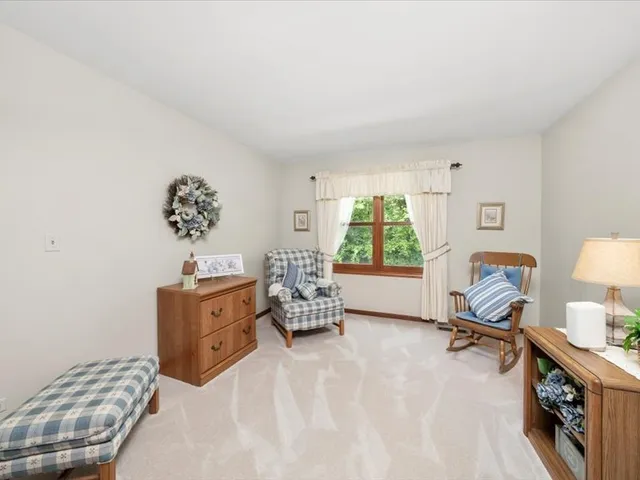 a room with furniture and a window