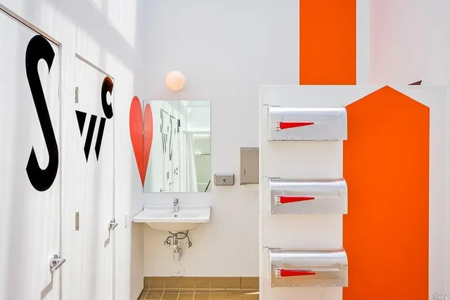 a bathroom with a sink and mirror
