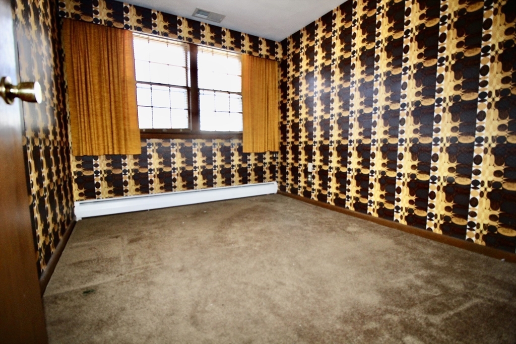 6 Montbatten Road Billerica, MA 01821 - Photo 11 of 22 a view of a room with window and stairs