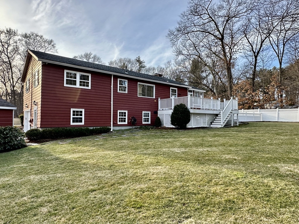 6 Montbatten Road Billerica, MA 01821 - Photo 19 of 22 a view of a house with a yard