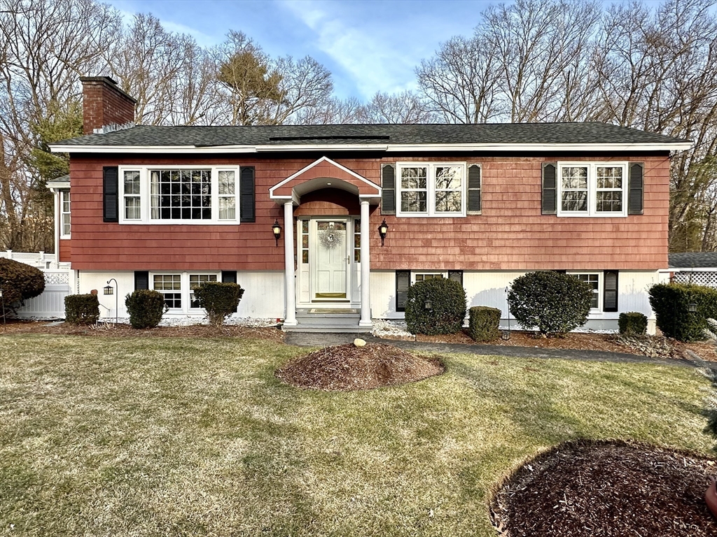 6 Montbatten Road Billerica, MA 01821 - Photo 2 of 22 a front view of a house with a yard