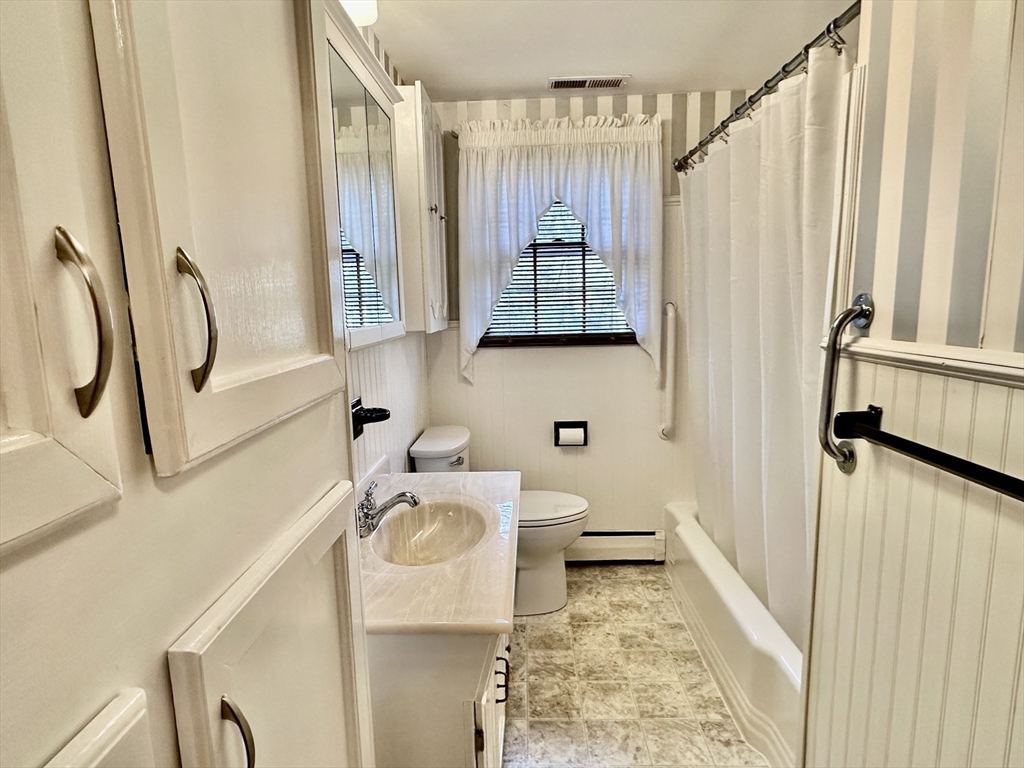 6 Montbatten Road Billerica, MA 01821 - Photo 9 of 22 a bathroom with a sink toilet and shower