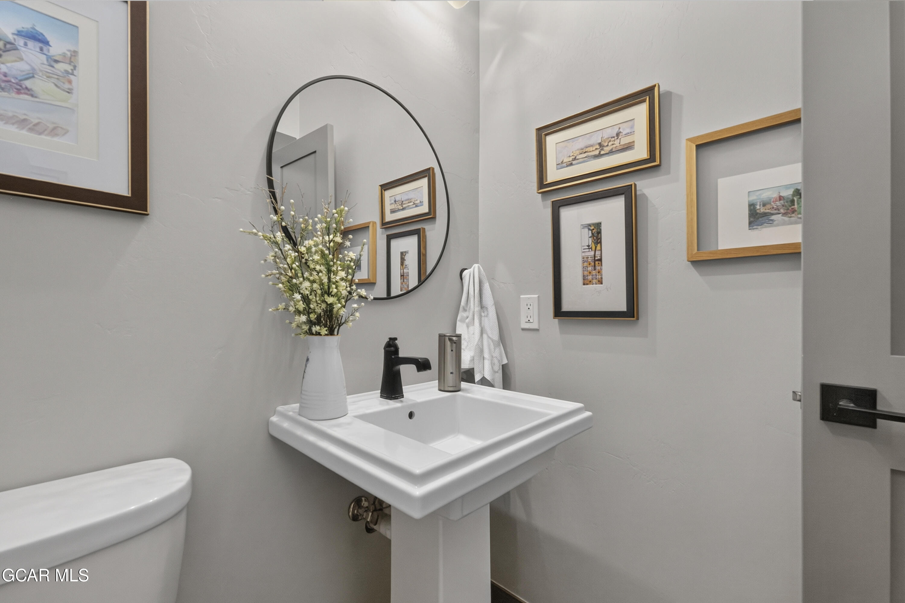 154 Eagle Ridge Drive Granby, CO 80446 - Photo 28 of 59 a bathroom with a sink and a mirror