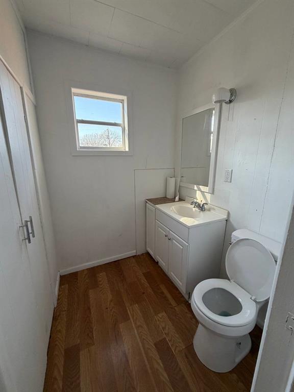 812 Tennessee Street Graham, TX 76450 - Photo 14 of 21 a bathroom with a sink toilet and vanity