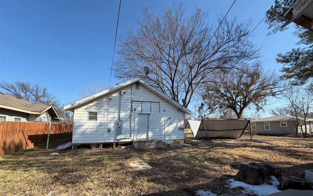 812 Tennessee Street Graham, TX 76450 - Photo 15 of 21 a view of a house with a yard