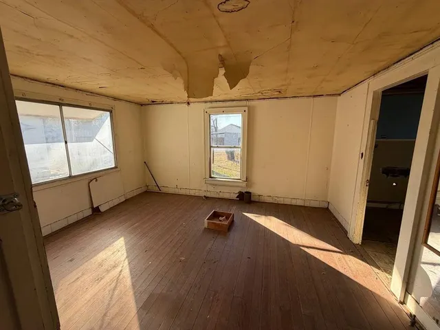 an empty room with windows