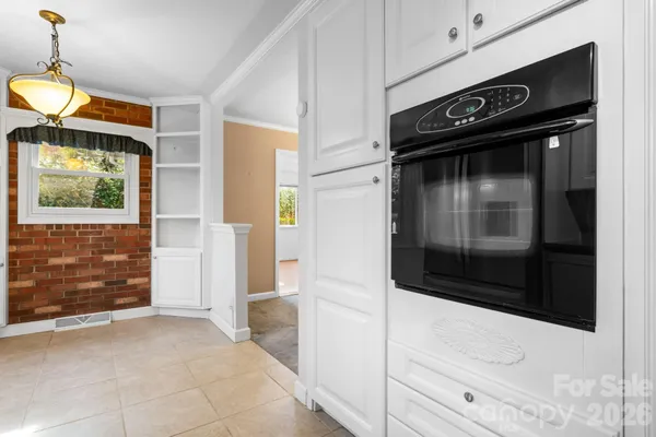 a hallway with storage and utility