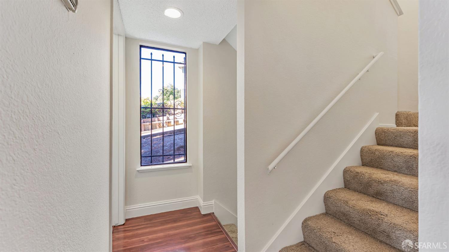 107 Alice Lane El Sobrante, CA 94803 - Photo 15 of 39 a view of entryway and hall with wooden floor