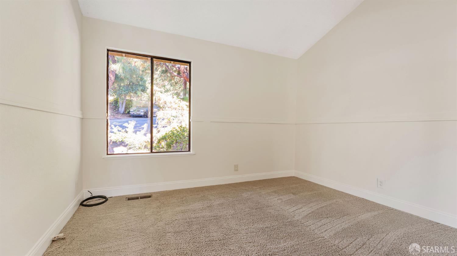 107 Alice Lane El Sobrante, CA 94803 - Photo 20 of 39 an empty room with windows