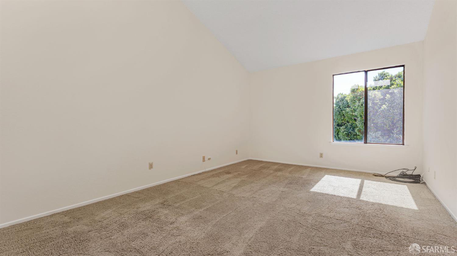 107 Alice Lane El Sobrante, CA 94803 - Photo 22 of 39 an empty room with windows