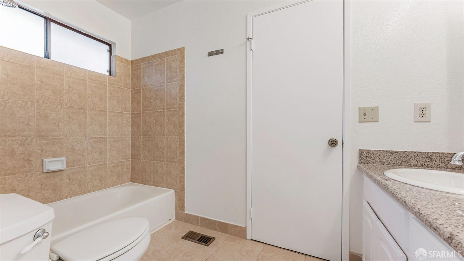 107 Alice Lane El Sobrante, CA 94803 - Photo 29 of 39 a bathroom with a granite countertop sink toilet and shower