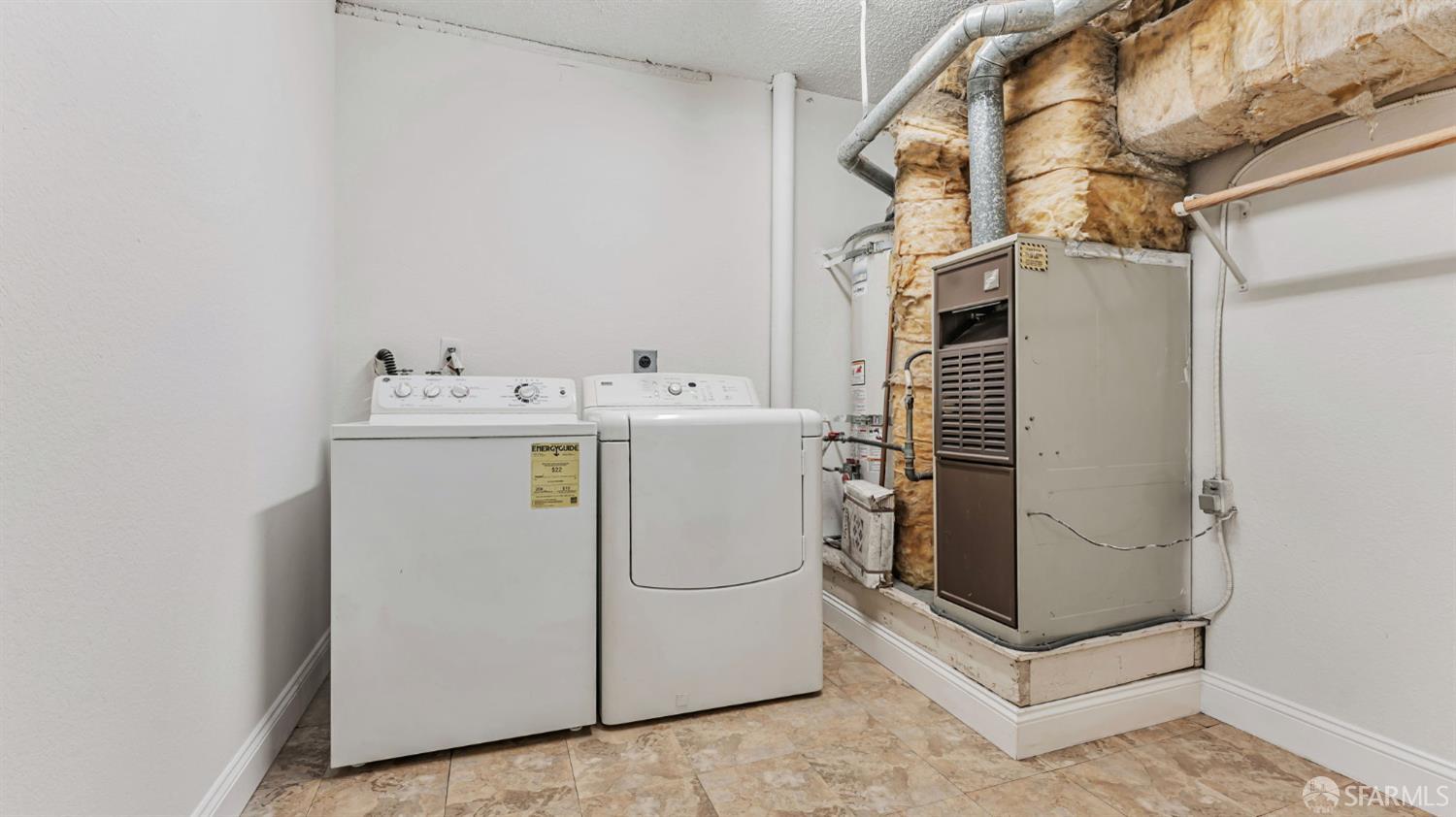 107 Alice Lane El Sobrante, CA 94803 - Photo 35 of 39 a utility room with dryer and washer
