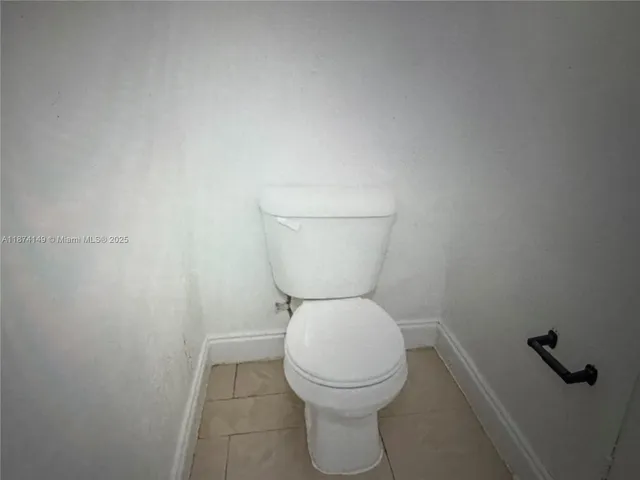 a bathroom with a toilet