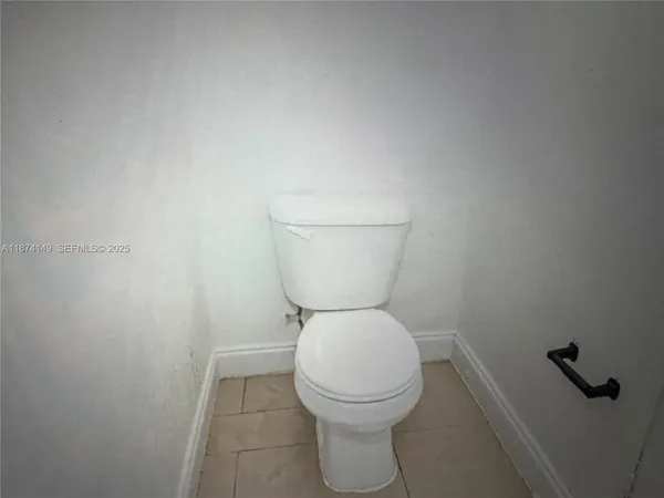 a bathroom with a toilet