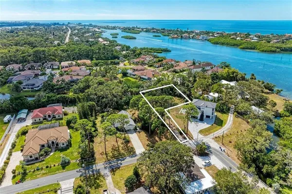 an aerial view of a house with a garden