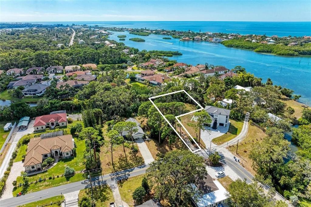 0 Roberts Road Nokomis, FL 34275 - Photo 5 of 9 an aerial view of a house with a garden