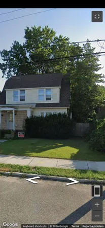 a view of a house with a swimming pool