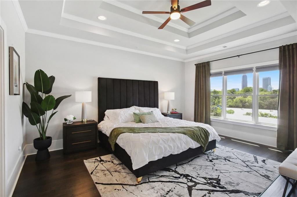 692 Drewry Street Northeast Atlanta, GA 30306 - Photo 11 of 25 a bedroom with a large bed and a window