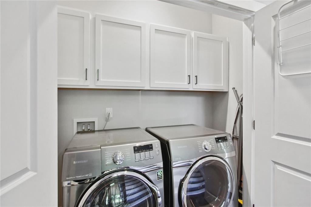 692 Drewry Street Northeast Atlanta, GA 30306 - Photo 21 of 25 a view of storage and utility room with washer and dryer