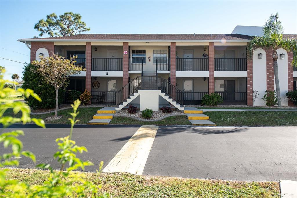 a view of pool with outdoor seating