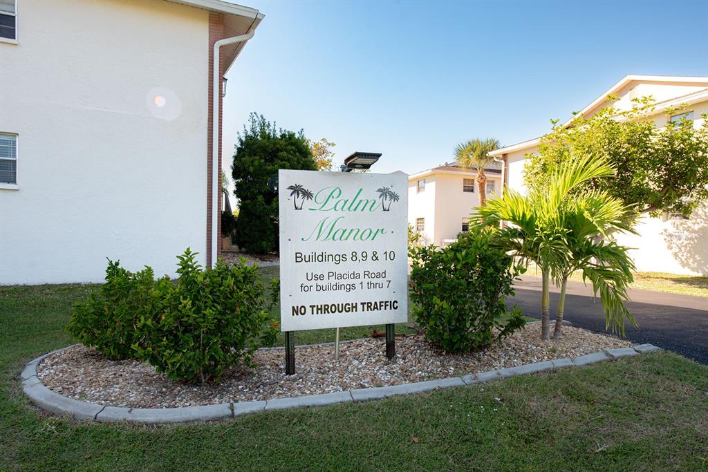 1531 Placida Road, Unit 8101 Englewood, FL 34223 - Photo 43 of 76 a sign on the side of the building