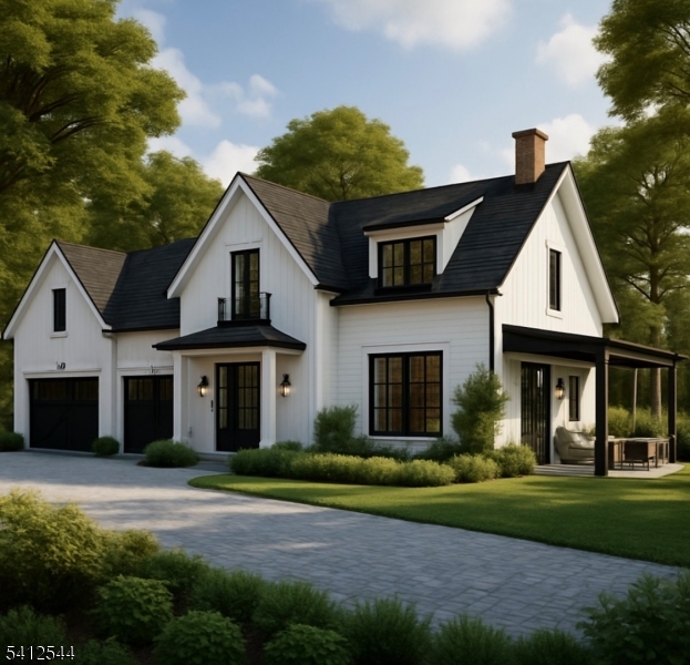 5 2nd Street Warren, NJ 07059 - Photo 2 of 5 a front view of a house with a yard and garage