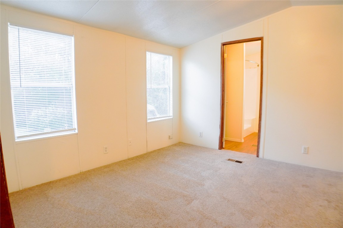 3408 Old Houston Road Huntsville, TX 77340 - Photo 9 of 10 an empty room with windows