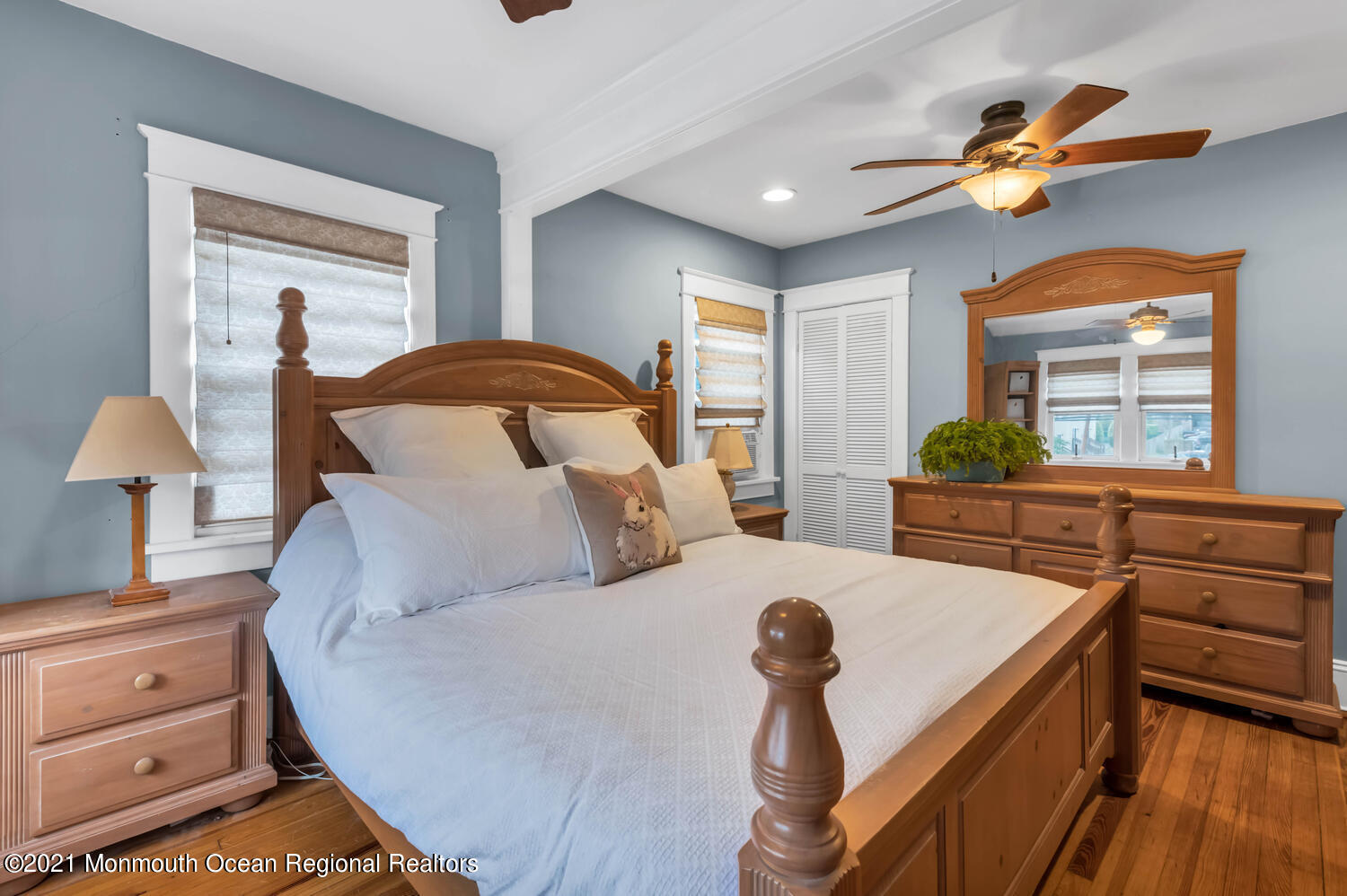 294 Spring Street Red Bank, NJ 07701 - Photo 13 of 21 a bedroom with furniture and a window