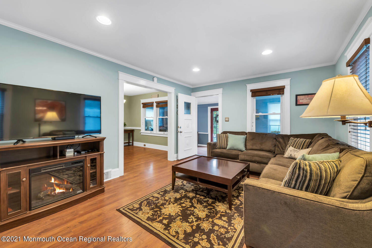 294 Spring Street Red Bank, NJ 07701 - Photo 4 of 21 a living room with furniture and a flat screen tv