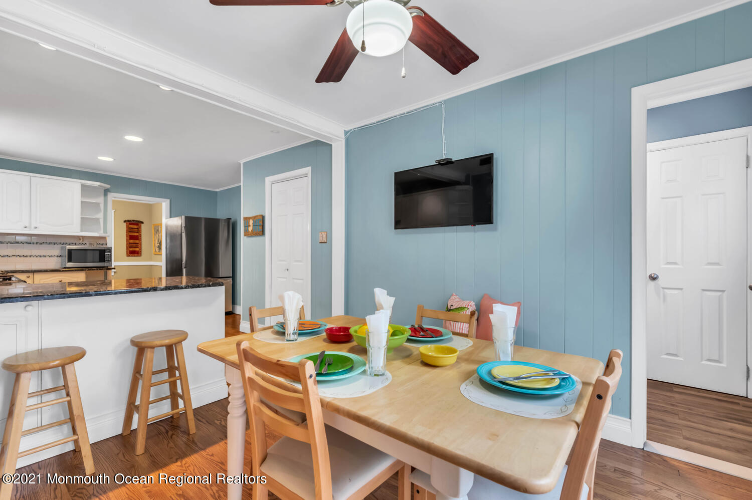 294 Spring Street Red Bank, NJ 07701 - Photo 10 of 21 a view of a dining room with furniture and wooden floor
