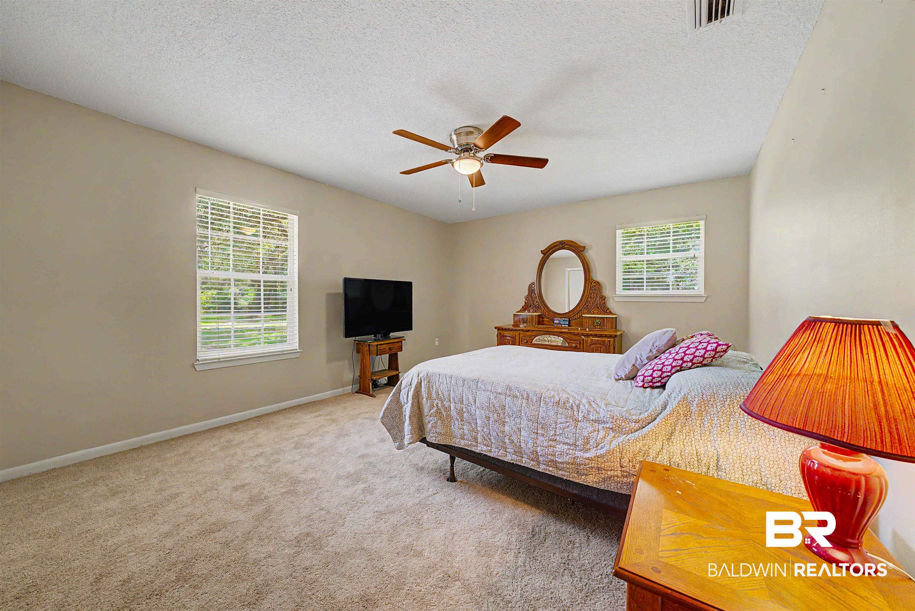 22963 Highway 98 Foley, AL 36535 - Photo 26 of 52 Carpeted bedroom with neutral wall tones and a ceiling fan