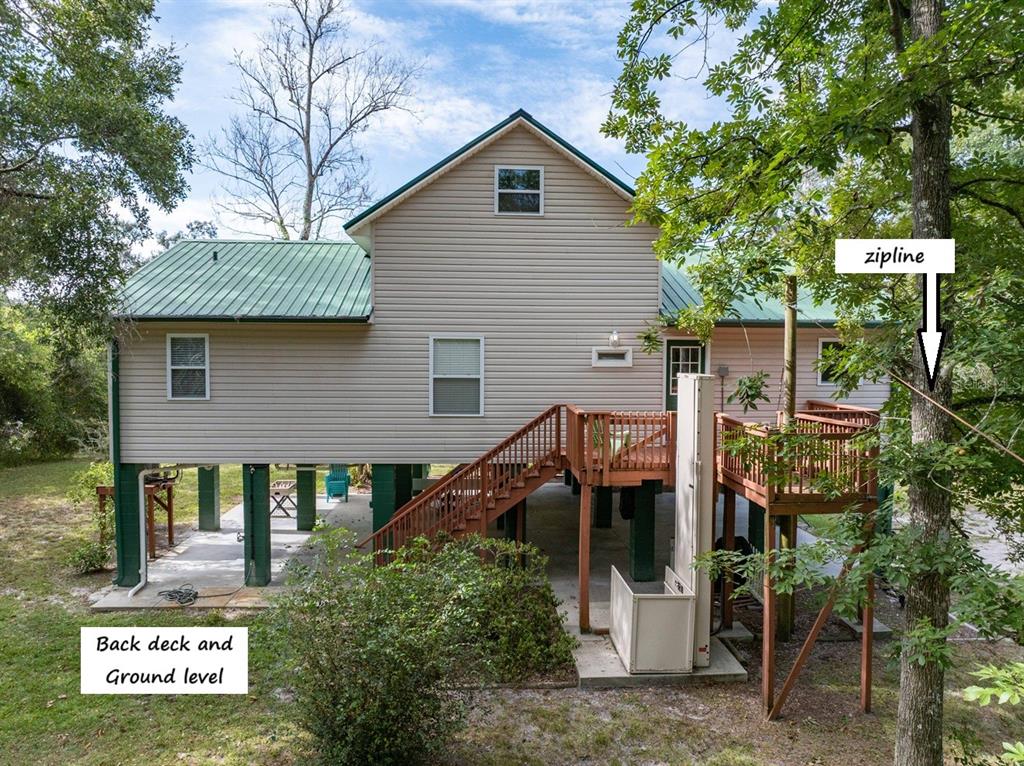 22205 North County Road 349 O'Brien, FL 32071 - Photo 27 of 73 a view of a house with wooden fence and floor