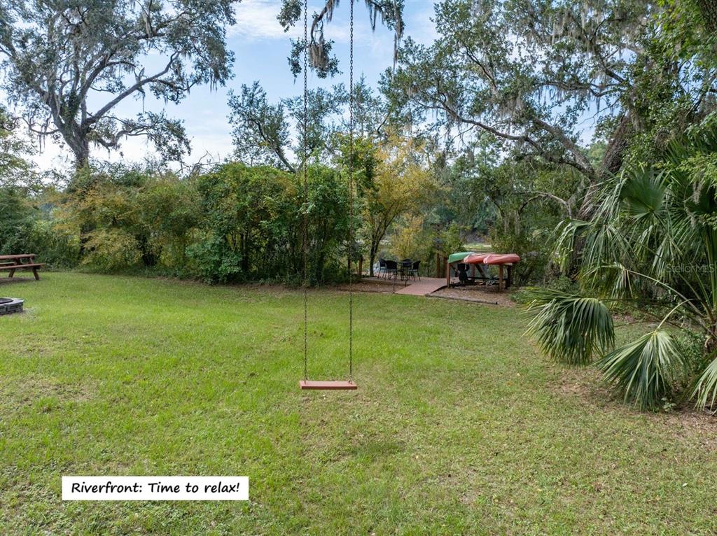 22205 North County Road 349 O'Brien, FL 32071 - Photo 32 of 73 a view of a backyard with a garden
