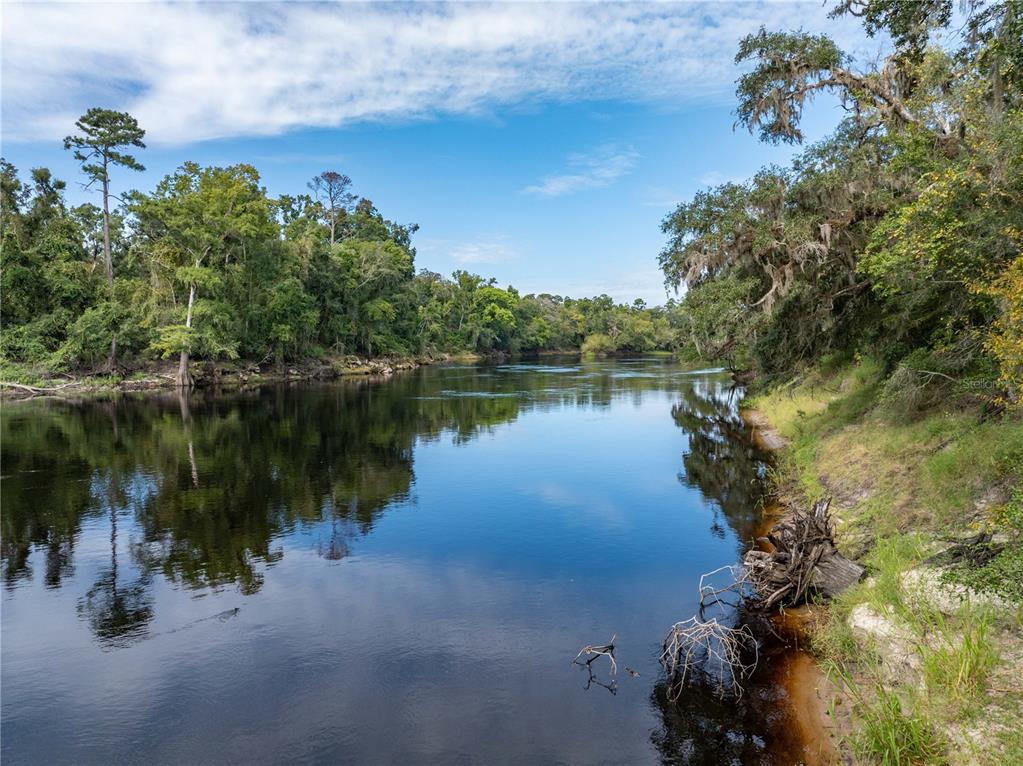 22205 North County Road 349 O'Brien, FL 32071 - Photo 33 of 68 a view of a lake with outdoor space