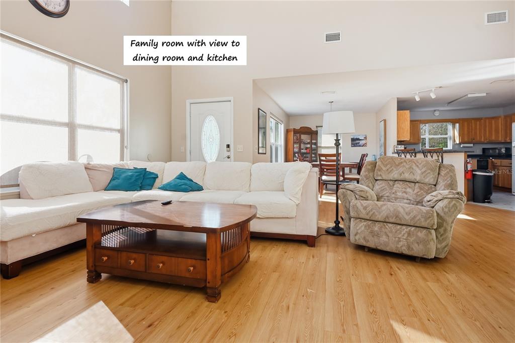 22205 North County Road 349 O'Brien, FL 32071 - Photo 4 of 73 a living room with furniture and a table