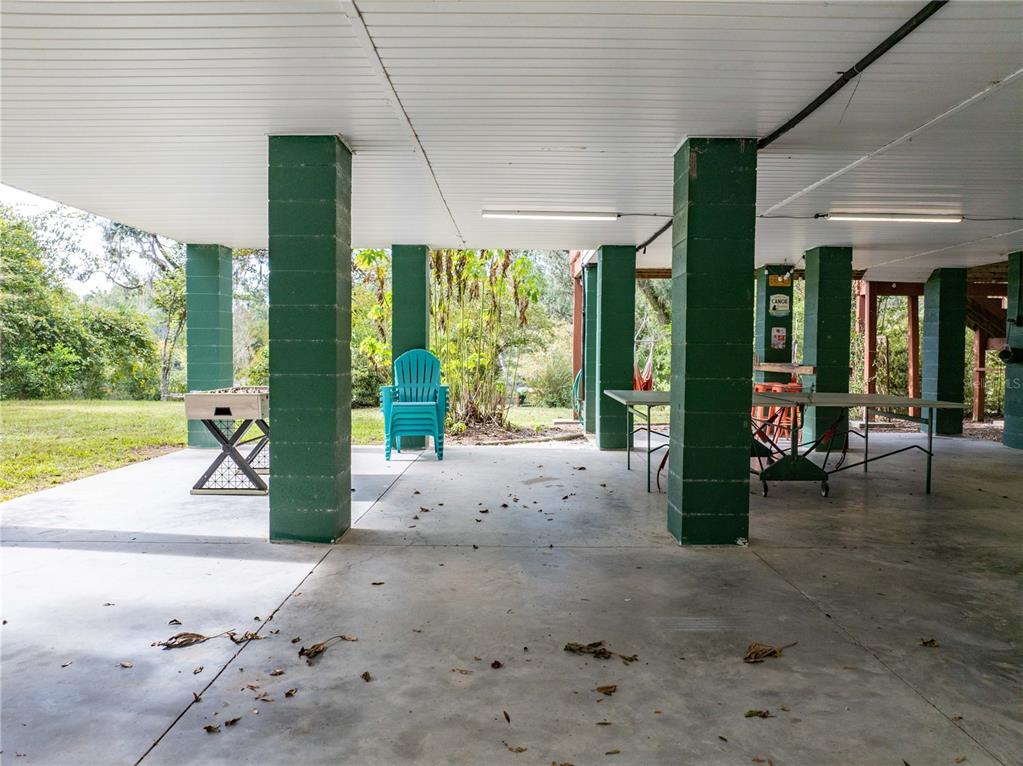 22205 North County Road 349 O'Brien, FL 32071 - Photo 45 of 68 a view of a house with backyard and porch