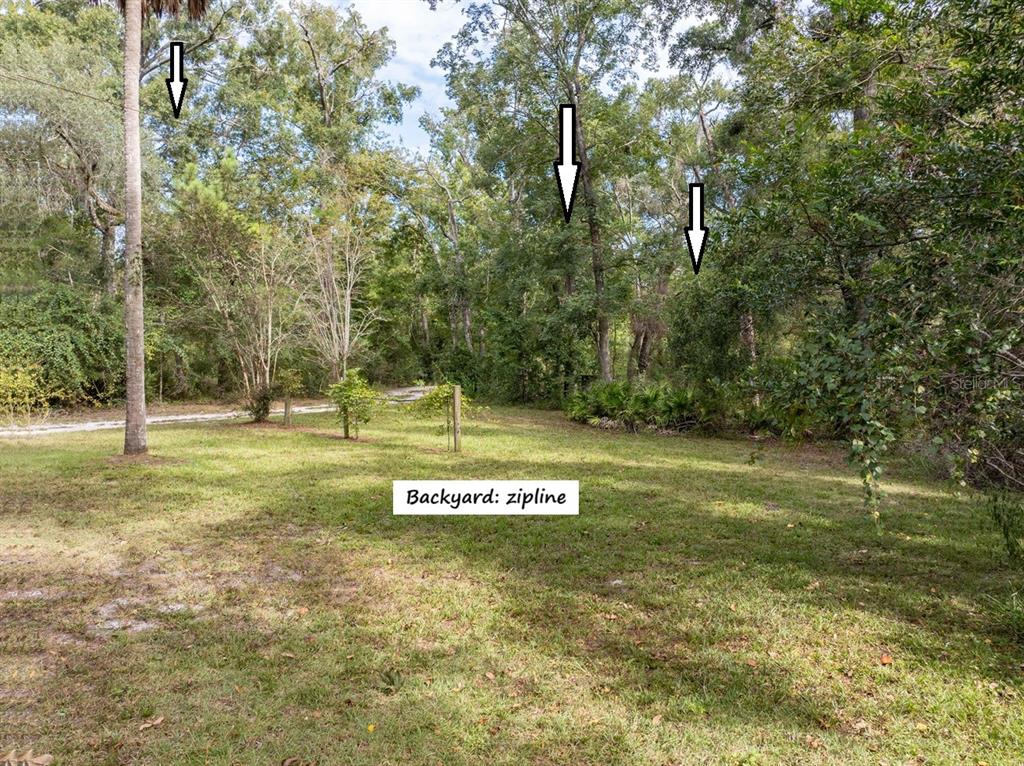 22205 North County Road 349 O'Brien, FL 32071 - Photo 48 of 73 a view of a house with a yard