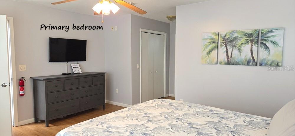 22205 North County Road 349 O'Brien, FL 32071 - Photo 10 of 73 a bedroom with a bed and a flat screen tv