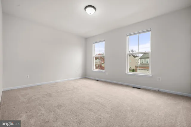 an empty room with an entryway