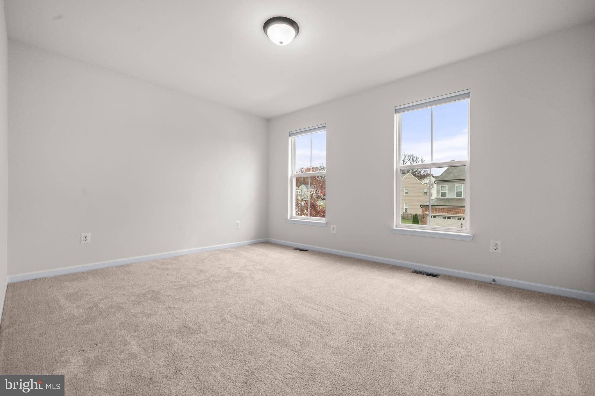 9516 Kimbleton Hall Loop Manassas Park, VA 20111 - Photo 27 of 51 an empty room with windows
