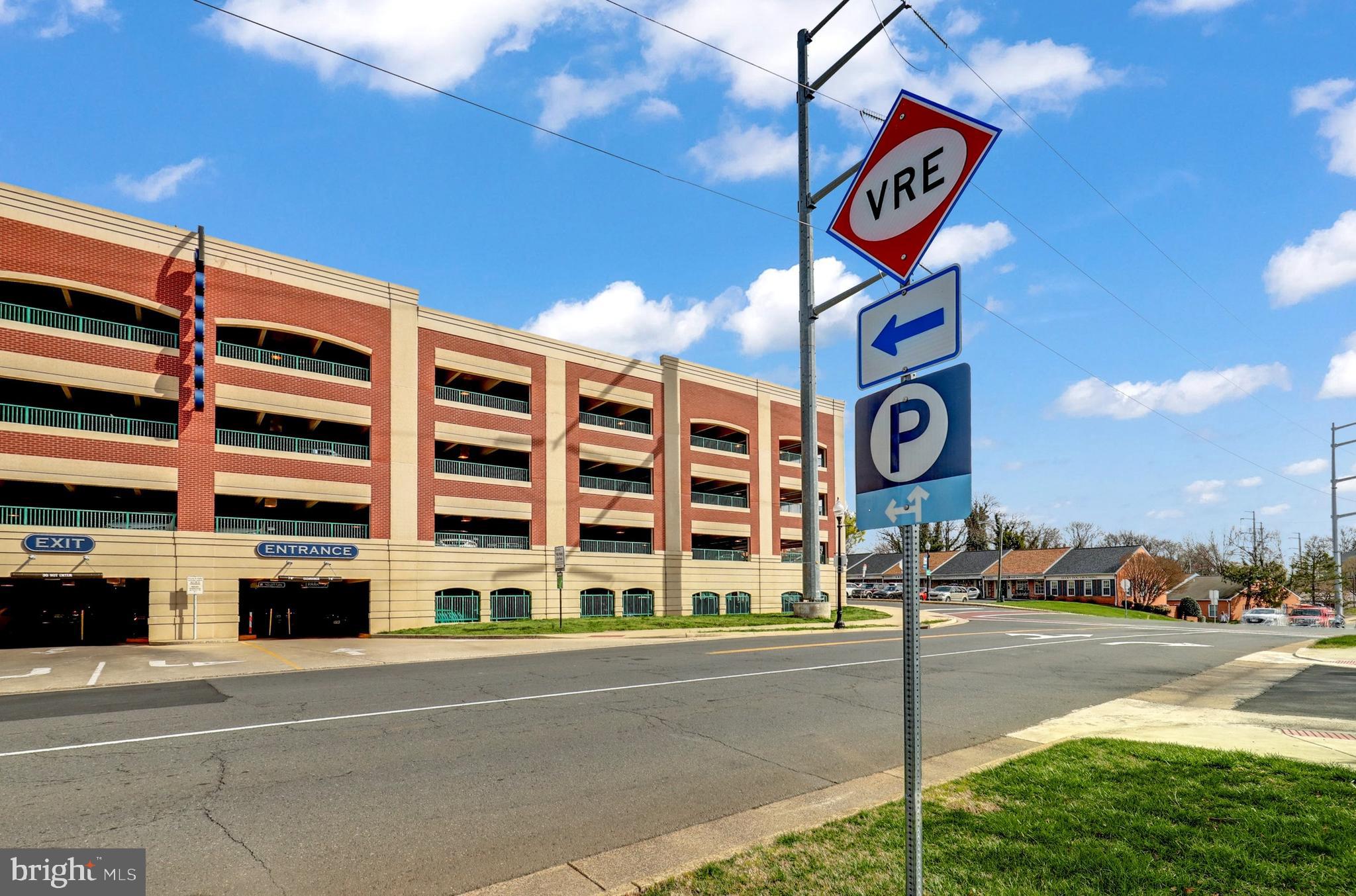 9516 Kimbleton Hall Loop Manassas Park, VA 20111 - Photo 42 of 51 a street sign on a pole on a street