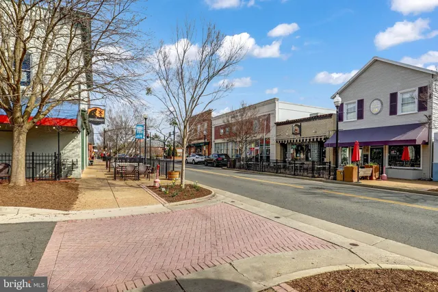 a view of street with shops