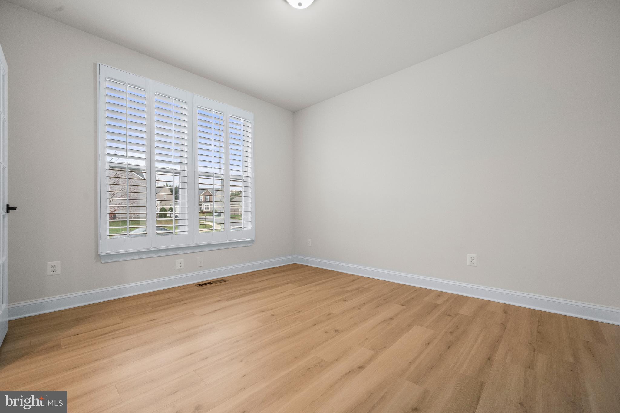 9516 Kimbleton Hall Loop Manassas Park, VA 20111 - Photo 5 of 51 an empty room with a window