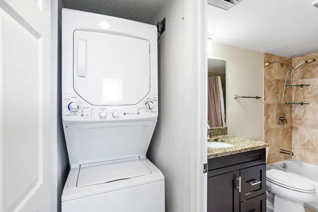 a bathroom with a toilet and a sink