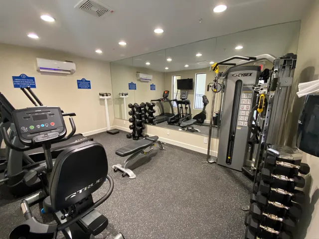 a view of a room with gym equipment