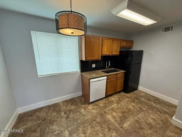 a storage room with washer and dryer