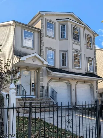 a front view of a house with a balcony