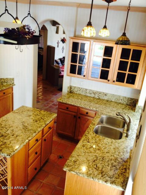 1135 East Frye Road Phoenix, AZ 85048 - Photo 12 of 60 Granite tops,high ceilings