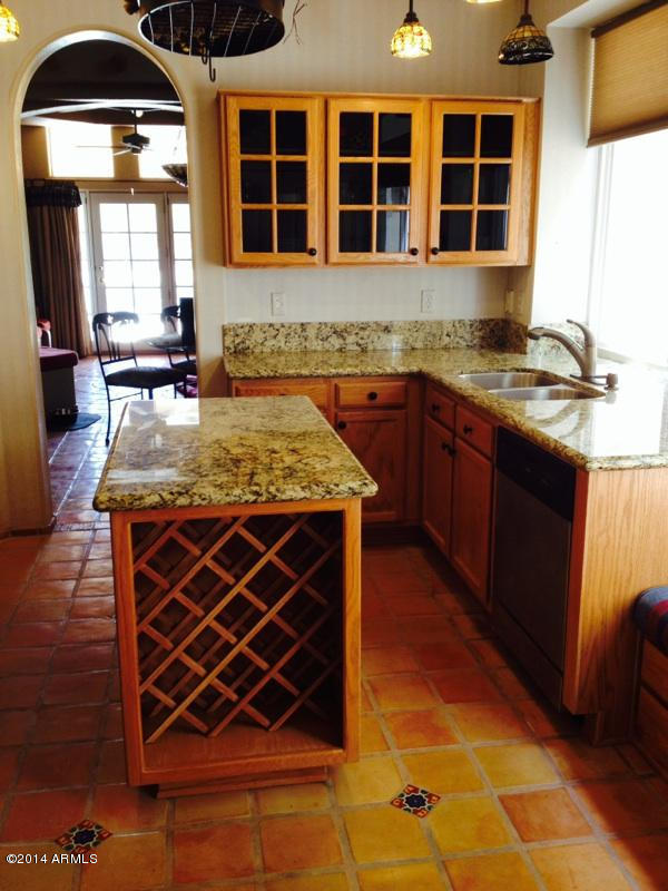 1135 East Frye Road Phoenix, AZ 85048 - Photo 2 of 60 new granite tops and stained cabinets