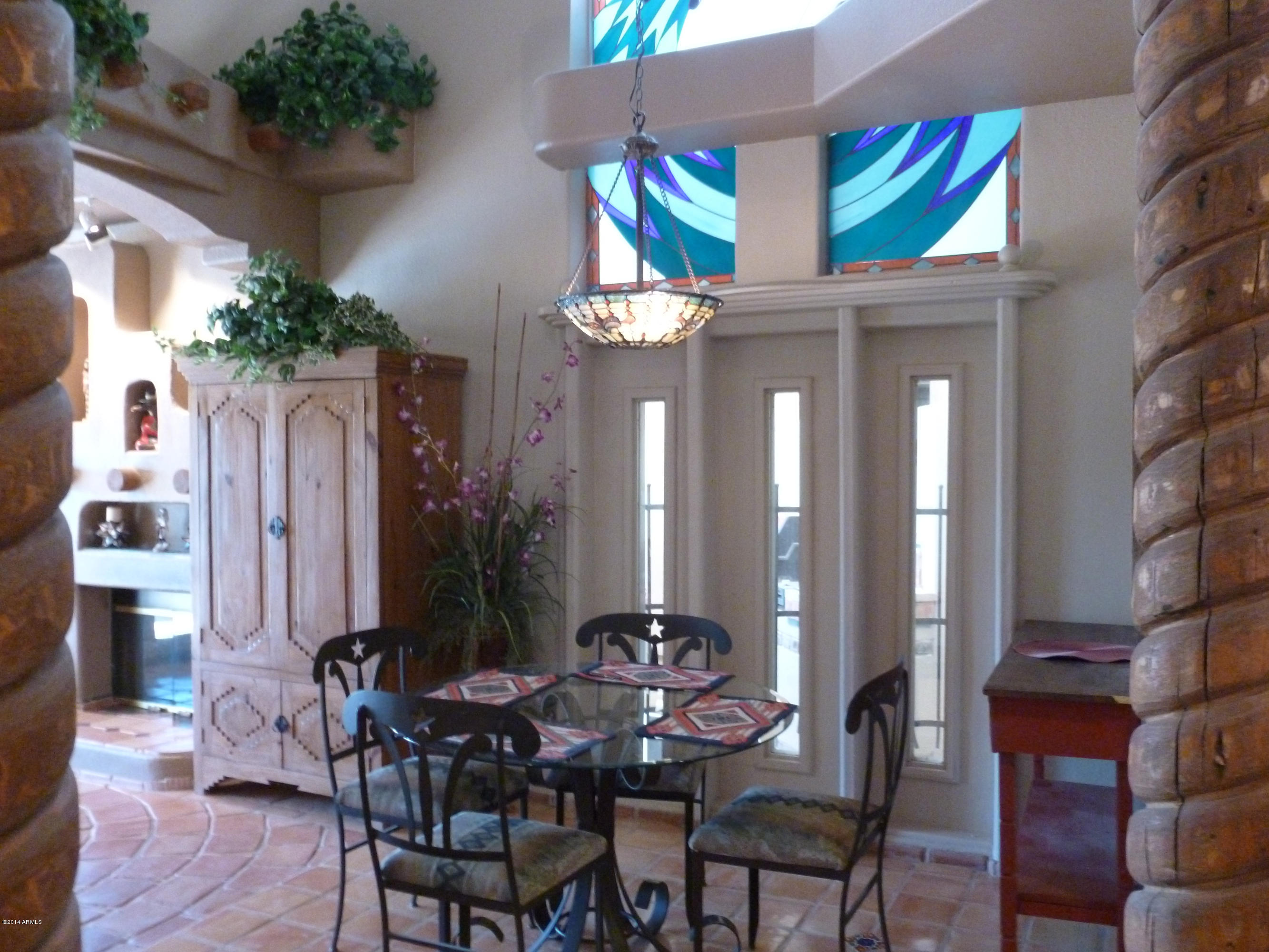 1135 East Frye Road Phoenix, AZ 85048 - Photo 6 of 60 Dining area of living,stained window abo